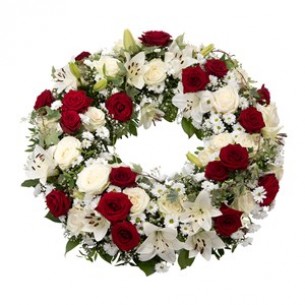 Funeral wreath in red and..