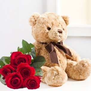 7 roses and teddy bear..
