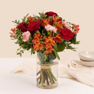 Mixed bouquet of warm ora..