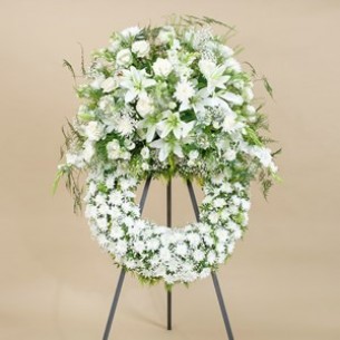 Funeral wreath with white..